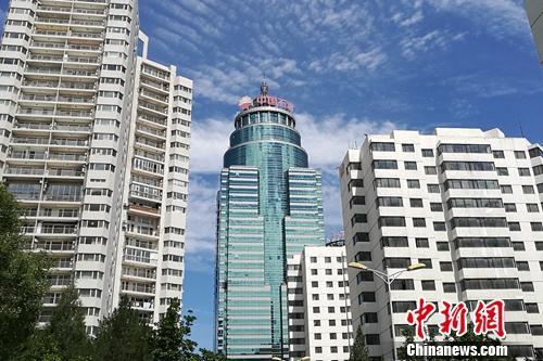 北京市亞運(yùn)村北辰附近某小區(qū)樓外景。<a target='_blank'  _fcksavedurl='http://www.chinanews.com/' ></table>中新網(wǎng)</a> 程春雨 攝
