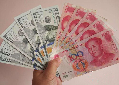 資料圖：人民幣和美元。<a target='_blank'  >中新網(wǎng)</a>記者 李金磊 攝
