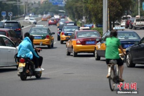 資料圖：居民打車出行需求旺盛。<a target='_blank'  >中新網(wǎng)</a>記者 金碩 攝