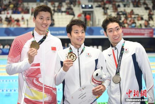 雅加達(dá)亞運(yùn)會(huì)游泳男子400米個(gè)人混合泳決賽，汪順獲得銅牌。(資料圖)<a target='_blank' >中新社</a>記者 侯宇 攝